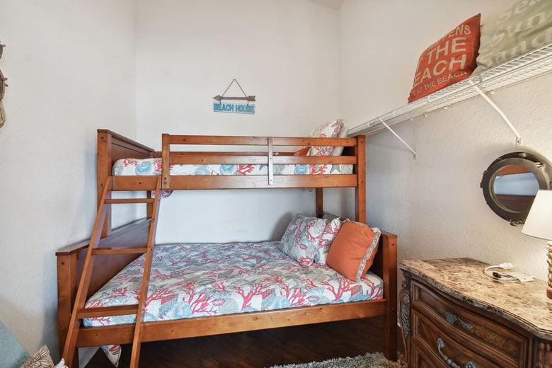 Bonus room with a twin-over-full bunk bed and a futon